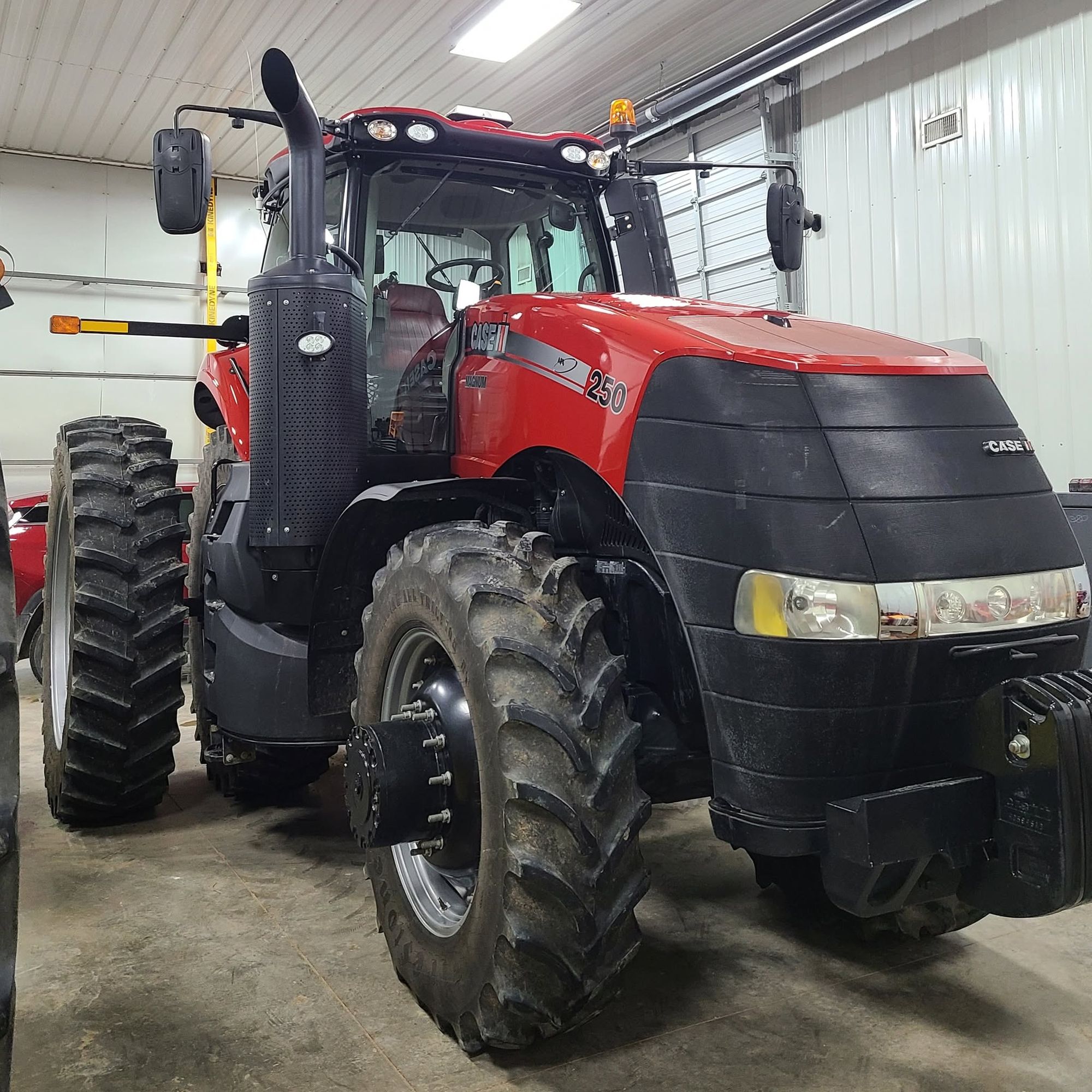 Red Case IH Magnum 250 tractor, front three quarter view, after detailing